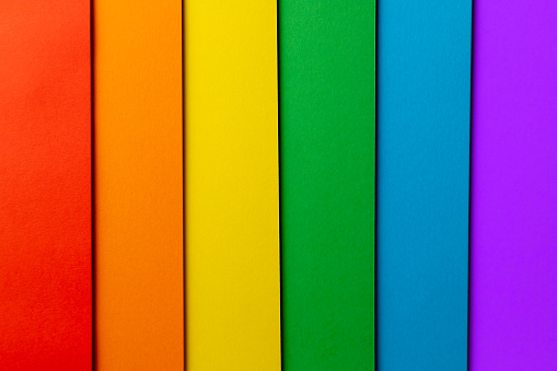 LGBTQ pride flag. Rainbow flag. Gay pride concept. Papers backgrounds.