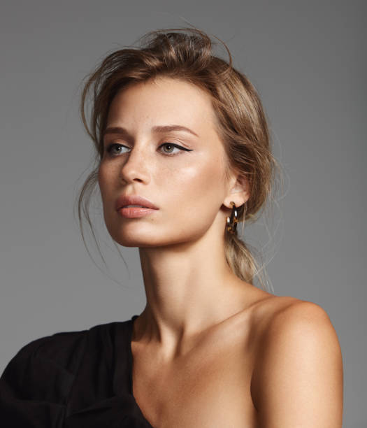 istock Beautiful stylish woman wearing black top 1163776152
