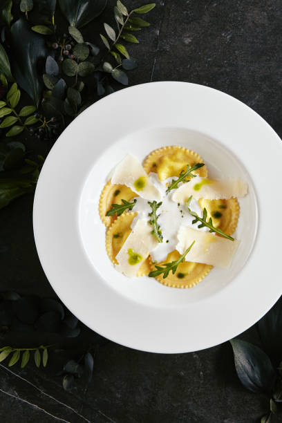 istock Ravioli 4 Cheeses with Cheese Espoume 1163779925