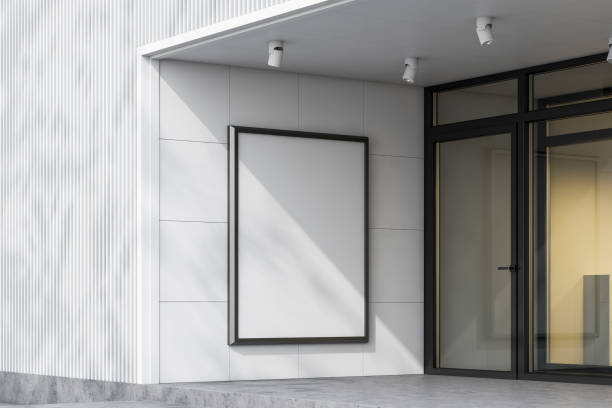 istock Mock up banner on white building wall 1163785413