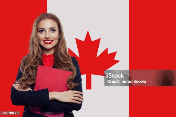 Canada Concept Young Woman Student With The Canada Flag Live Work Education And Internship In Canada Stock Photo - Download Image Now