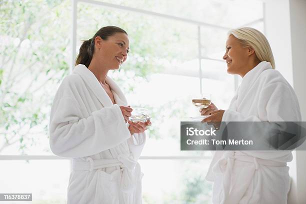 Friends Drinking Tea At Spa Stock Photo - Download Image Now - 30-34 Years, 30-39 Years, 35-39 Years