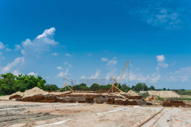 istock a large construction site, machinery workers build a new bridge 1163788799