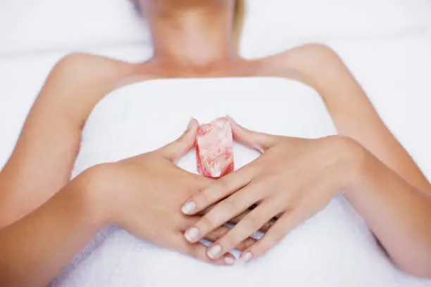 Photo of Woman laying with crystal