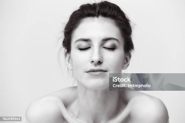 Black And White Portrait Of A Young Caucasian Woman Stock Photo - Download Image Now