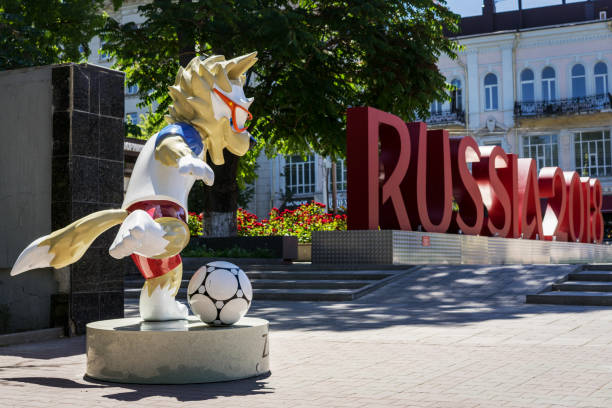 ROSTOV-ON-DON, RUSSIA - 11 June, 2018 The official mascot of the 2018 FIFA World Cup and the FIFA Confederations Cup 2017 wolf Zabivaka  scores a goal. A monument with the letters "Russia 2018" ROSTOV-ON-DON, RUSSIA - 11 June, 2018 The official mascot of the 2018 FIFA World Cup and the FIFA Confederations Cup 2017 wolf Zabivaka  scores a goal. A monument with the letters "Russia 2018" 2018 stock pictures, royalty-free photos & images
