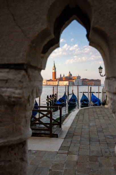 istock Abstract view of Giudecca island and gondolas on Venice canals 1163793127