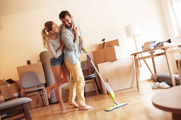istock Couple moving into new house. 1163794560