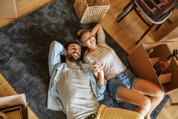 Couple moving into new home.