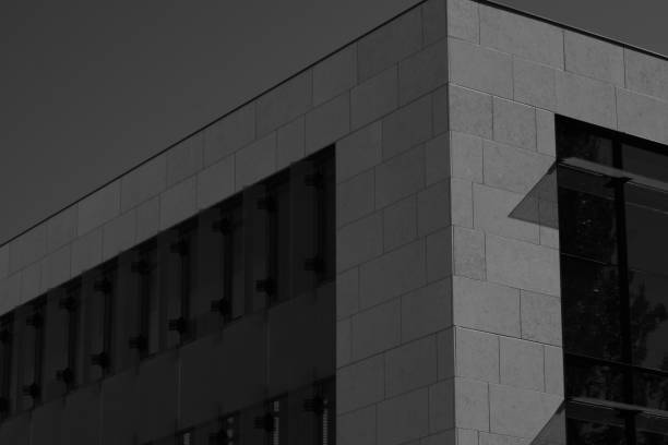 istock Corner Of Modern Building Exterior In Black And White 1163798540