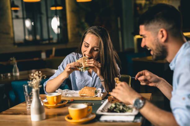istock couple at a restaurant 1163798553