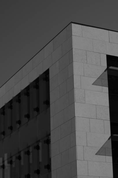 istock Corner Of Modern Building Exterior In Black And White 1163798568