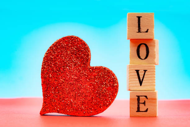 istock word love written with wooden cubes 1163806766