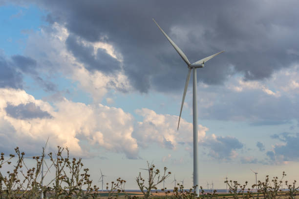 istock Wind turbine on a stormy sky 1163808803