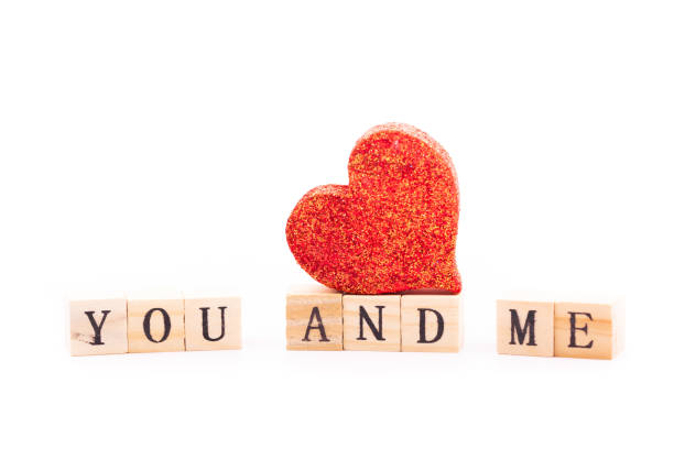 istock you and me written on wooden cubes 1163809734