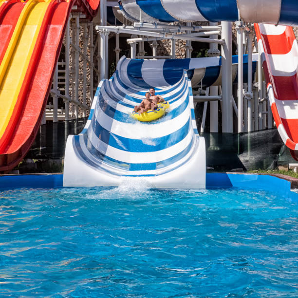 istock Father and son enjoying weekend at aquapark 1163809920