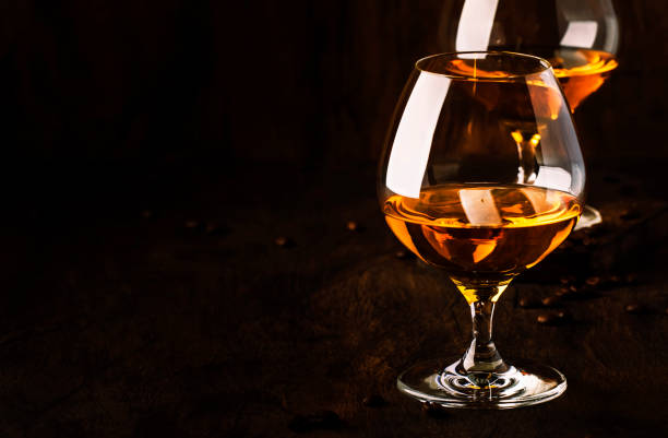 istock Armagnac, French grape brandy, strong alcoholic drink. Still life in vintage style, selective focus 1163812921
