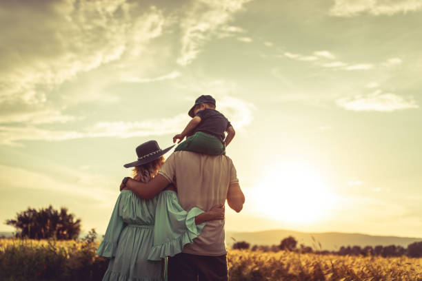 istock Happy young couple spending time with their son 1163817960
