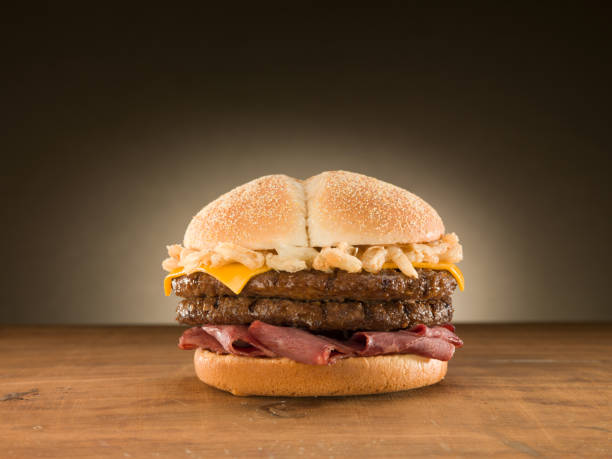 istock Double Cheese burger on wooden table. 1163818442