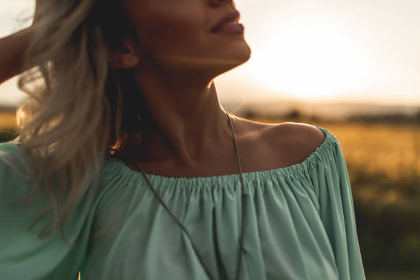 istock Woman enjoying the sunlight 1163821466