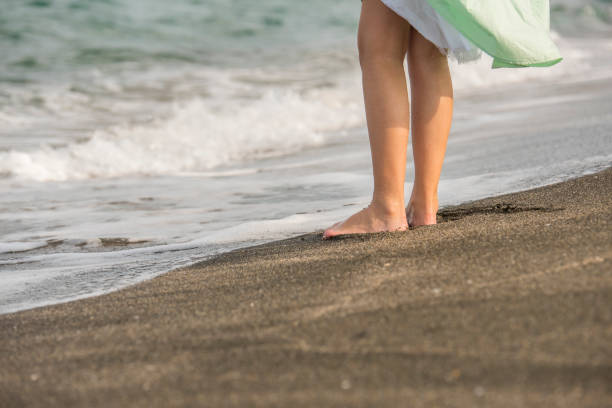 istock Girl  with bare feet 1163824359