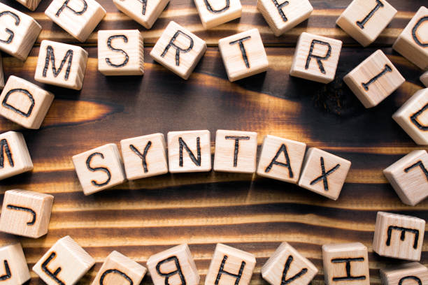 istock syntax  composed of wooden cubes with letters 1163824539