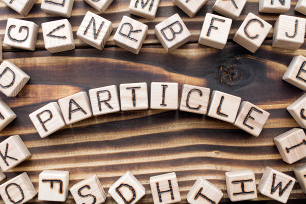 istock word particle composed of wooden cubes with letters 1163824547
