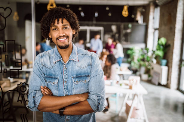 istock Handsome Successful African Businessman Representing His Team 1163825161