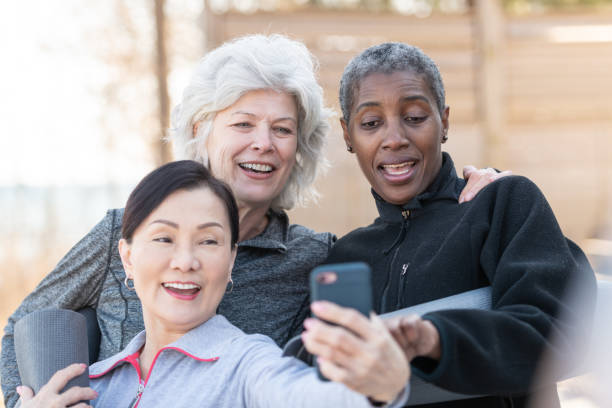 istock Elderly Friends Posing After Yoga 1163827612