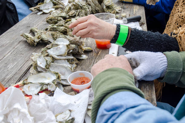istock Outdoor Winter Oyster Roast 1163828504