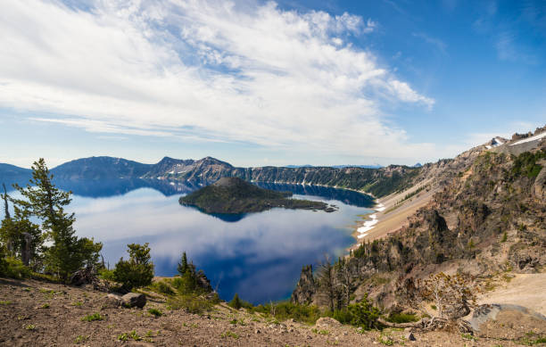 istock Panoramic View of Crater Lake with Wizard Island 1163829800