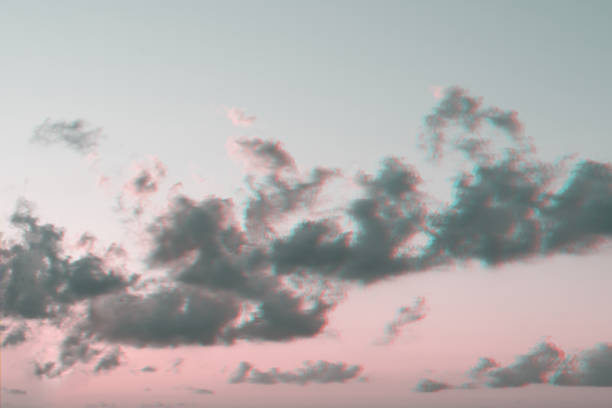 istock Abstract pastel watercolor pink susnset clouds sky with glitch effect 1163831387