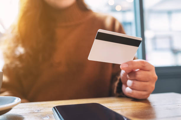 istock A woman using credit card for purchasing and shopping online 1163841462