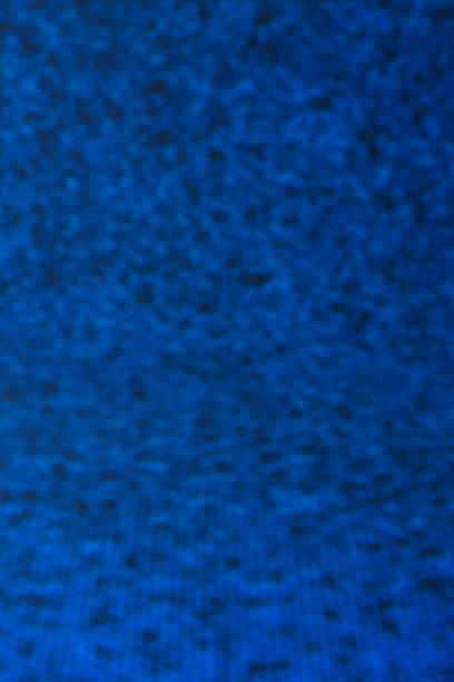 istock Abstract blurred background of blue paper. 1163842104
