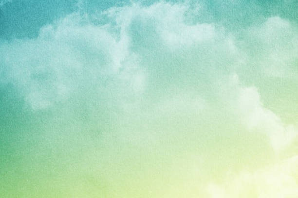 istock fantastic cloudy sky with pastel gradient color with grunge paper texture, nature abstract background 1163842295