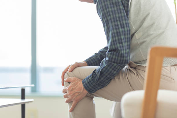 istock Senior man hurting his knee 1163843405