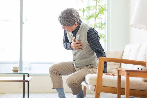 istock Senior man holding chest with hands 1163843447