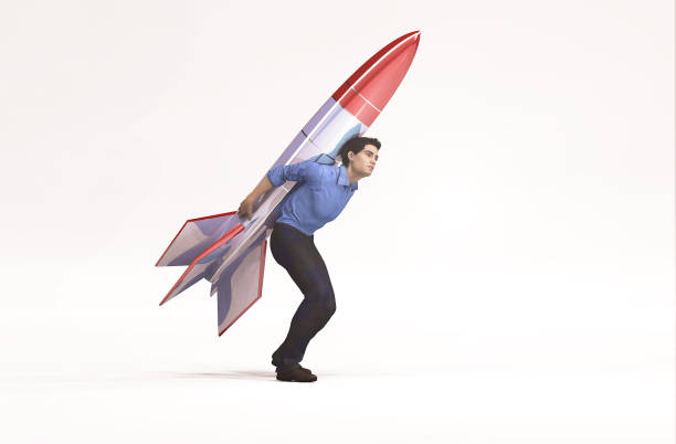 istock Businessman with a rocket on his back ready to launch. 3d illustration 1163846443