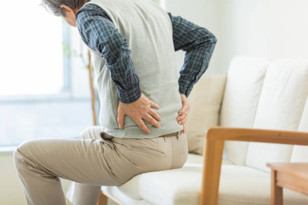 Senior man hurting his back