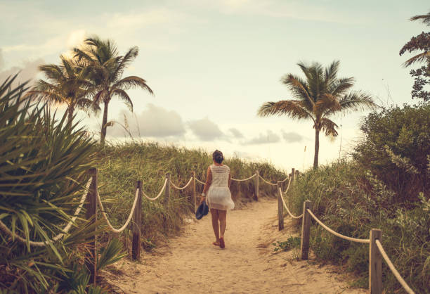 Woman on a footpath in Miami Beach