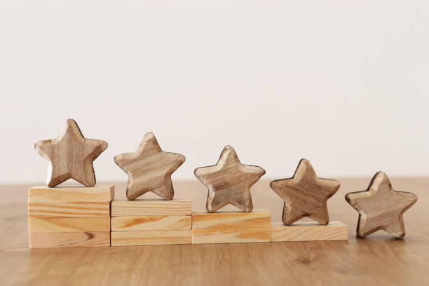 istock business concept image of setting a five star goal. increase rating or ranking, evaluation and classification idea 1163857341
