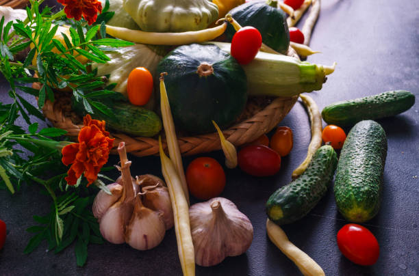 istock Different vegetables, small patissons, along with other vegetables, cauliflower, broccoli, garlic, cucumbers grown on an eco-farm. 1163861616