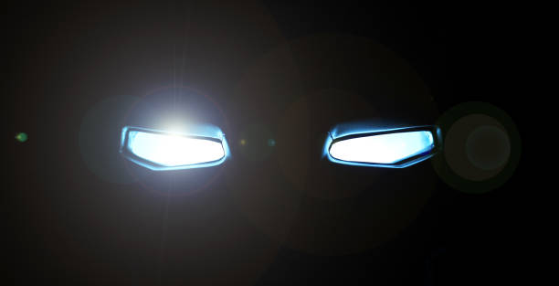 istock Abstract a robot Glowing eyes in in the dark 1163861621