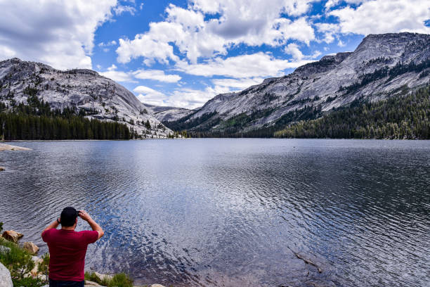 istock Men taking a picture in Yosemite 1163862659
