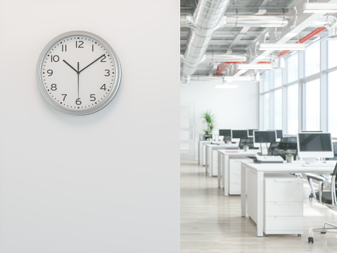 Clock on white wall in Office