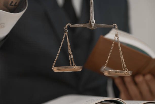 istock lawyer or judge work in the office with gavel and scale 1163863937