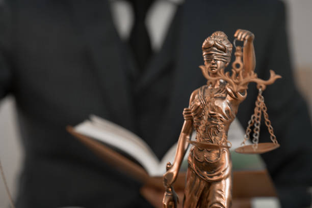 istock lawyer or judge work in the office with gavel and scale 1163864056
