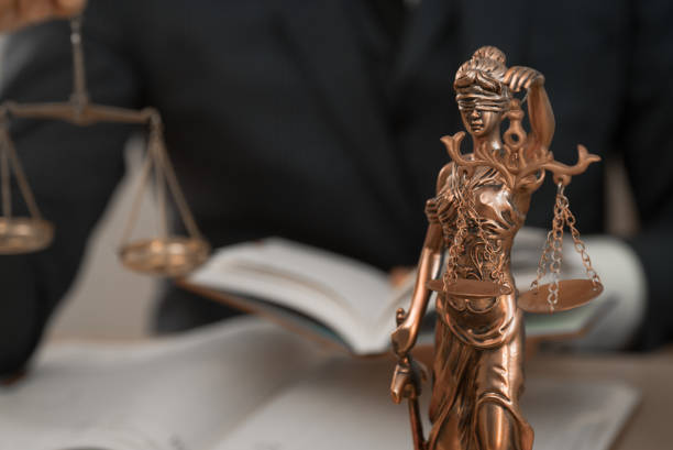 istock lawyer or judge work in the office with gavel and scale 1163864115