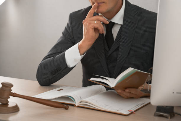 istock lawyer or judge work in the office with gavel and scale 1163865260