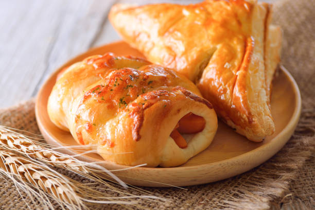 istock sausage bread on wooden plate 1163866166